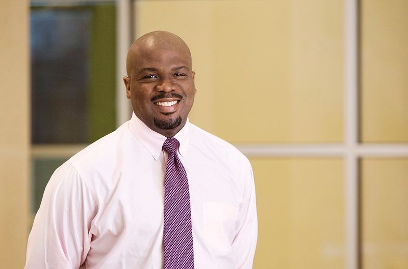 Headshot of faculty member, Dr. Julius Demps II.