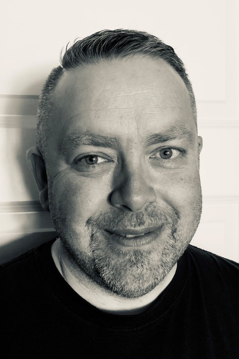 Headshot of alumni, Jason Weibel.