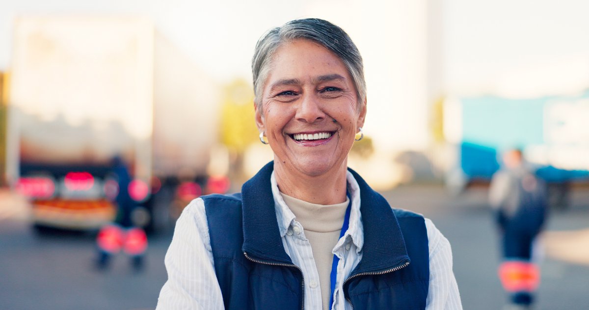 Safety professional standing in logistics depot.