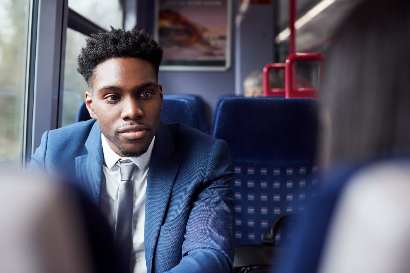 Man commuting by train